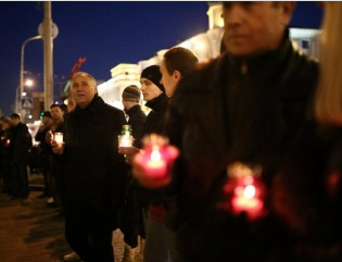 About 150 people came to the KGB headquarters in Minsk to commemorate the killed
